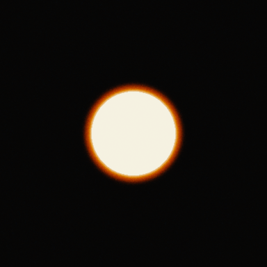 A bright white disc 120 px across on a dark background on Super 35 4-perf: the red-orange halo reaches about 15 px beyond the disc.
